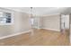 Spacious dining area with hardwood floors and chandelier at 5317 Ten Ten Rd, Apex, NC 27539