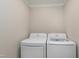 Laundry room with washer and dryer at 5317 Ten Ten Rd, Apex, NC 27539