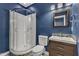 Bathroom with shower stall, toilet and granite sink with a contemporary design at 664 Long Melford Dr, Rolesville, NC 27571