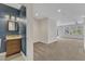 Modern half bathroom featuring stylish mirror and granite sink with designer lighting at 664 Long Melford Dr, Rolesville, NC 27571