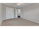 This bedroom features neutral walls, carpet, and a ceiling fan for added comfort at 664 Long Melford Dr, Rolesville, NC 27571
