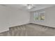 Bright bedroom featuring neutral carpet, light-colored walls and window with a view at 664 Long Melford Dr, Rolesville, NC 27571