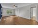 Spacious bonus room boasts hardwood flooring, a ceiling fan, and plenty of natural light at 664 Long Melford Dr, Rolesville, NC 27571