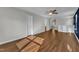 Bonus room boasts hardwood flooring, a ceiling fan, and plenty of natural light at 664 Long Melford Dr, Rolesville, NC 27571