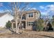 Attractive home with stone accents, a two-car garage, and professional landscaping at 664 Long Melford Dr, Rolesville, NC 27571
