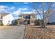 Charming two-story home with a stone facade and a two-car attached garage at 664 Long Melford Dr, Rolesville, NC 27571