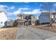 Beautiful two-story home featuring a well-manicured lawn and an extended driveway at 664 Long Melford Dr, Rolesville, NC 27571
