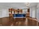 Bright kitchen with large island, wooden cabinetry, and stainless appliances at 664 Long Melford Dr, Rolesville, NC 27571