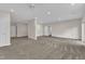 Spacious room featuring neutral carpet and recessed lighting at 664 Long Melford Dr, Rolesville, NC 27571
