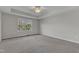 Neutral main bedroom featuring a window with natural light, carpet floors, and plenty of space to unwind at 664 Long Melford Dr, Rolesville, NC 27571