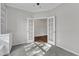 Bright room with white trim and doors to next room at 664 Long Melford Dr, Rolesville, NC 27571