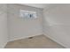 Spacious walk-in closet with built-in shelves providing plenty of storage and natural lighting from a large window at 664 Long Melford Dr, Rolesville, NC 27571