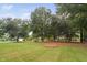 Spacious backyard with mature trees and a tranquil atmosphere at 7440 Bleasdale Ct, Apex, NC 27539