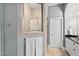 Bathroom with shower and granite countertops at 7440 Bleasdale Ct, Apex, NC 27539