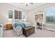 Spacious bedroom with a built-in workspace and window seats at 7440 Bleasdale Ct, Apex, NC 27539