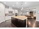 Island kitchen with granite countertops and stainless steel appliances at 7440 Bleasdale Ct, Apex, NC 27539