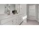 Modern bathroom with double vanity, quartz countertop and walk-in shower at 776 Denburn Pl, Raleigh, NC 27603