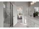 Elegant bathroom with double vanity, large mirror and walk-in shower at 776 Denburn Pl, Raleigh, NC 27603