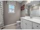 Simple bathroom with vanity, toilet and shower/tub combo at 776 Denburn Pl, Raleigh, NC 27603