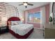 Bedroom with a large bed and fun wall art at 776 Denburn Pl, Raleigh, NC 27603