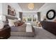 Main bedroom with a king-size bed, large windows, and ample natural light at 776 Denburn Pl, Raleigh, NC 27603
