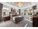 Spacious main bedroom with large windows and plush carpeting at 776 Denburn Pl, Raleigh, NC 27603