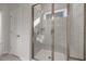 Spacious walk-in shower with tiled walls and built-in seat at 776 Denburn Pl, Raleigh, NC 27603