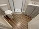 Small bathroom with shower and gray vanity at 902 Laurel Gate Dr, Wake Forest, NC 27587
