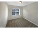 Simple bedroom with carpet, window and light fixture at 902 Laurel Gate Dr, Wake Forest, NC 27587