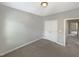 Bedroom with carpet, double doors, and window at 902 Laurel Gate Dr, Wake Forest, NC 27587