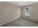 Bedroom with carpet, window, and light fixture at 902 Laurel Gate Dr, Wake Forest, NC 27587