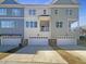 Townhouse exterior with two-car garages at 902 Laurel Gate Dr, Wake Forest, NC 27587