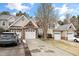 A well-maintained townhouse featuring attached garages and a neat driveway, blending convenience with curb appeal at 9412 Harvest Acres Ct, Raleigh, NC 27617