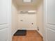 Laundry room with tile floor, wire shelving and hook-ups at 9412 Harvest Acres Ct, Raleigh, NC 27617