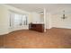 Entertainment area with wine bar, mini refrigerator, and tile floor is great for hosting guests at 9412 Harvest Acres Ct, Raleigh, NC 27617