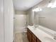 Well-appointed bathroom with double vanity and a tub at 1012 Fulbright Dr, Morrisville, NC 27560