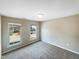 Spacious bedroom with two windows and neutral decor at 1012 Fulbright Dr, Morrisville, NC 27560