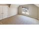 Bright bedroom with double doors and carpet at 1012 Fulbright Dr, Morrisville, NC 27560