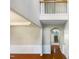 Bright and airy entryway with hardwood floors and a staircase at 1012 Fulbright Dr, Morrisville, NC 27560