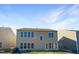Two-story house with beige siding and multiple windows at 1012 Fulbright Dr, Morrisville, NC 27560