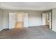 Large main bedroom with plush carpeting and an ensuite bathroom at 1012 Fulbright Dr, Morrisville, NC 27560