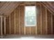 Spacious attic with a view through the window at 1021 Smoke Willow Way # 130, Rolesville, NC 27571