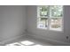 Bedroom featuring large windows at 1021 Smoke Willow Way # 130, Rolesville, NC 27571