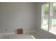 Room featuring a large window with natural light, ready for customization and personal touches at 1021 Smoke Willow Way # 130, Rolesville, NC 27571