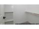 Walk-in closet with shelves and a hanging rod at 1021 Smoke Willow Way # 130, Rolesville, NC 27571