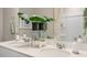 Double vanity bathroom with modern fixtures and a large mirror at 104 Kobus Ct, Garner, NC 27529