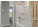 Bathroom with shower/tub combo and access to another room at 104 Kobus Ct, Garner, NC 27529