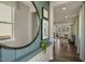 Bright and airy entryway with a large mirror and view into the living area at 119 Siebold St, Garner, NC 27529