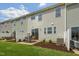 Private patio and fenced backyard with grassy area at 120 Kobus Ct, Garner, NC 27529