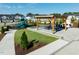 Community gathering area with pergola, playground, and picnic tables at 120 Kobus Ct, Garner, NC 27529